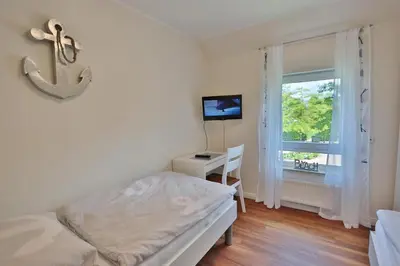 Ein Bett oder Betten in einem Zimmer der Unterkunft Feriendomizil am Konsulweg Feriendomizil am Konsulweg Appartement 6