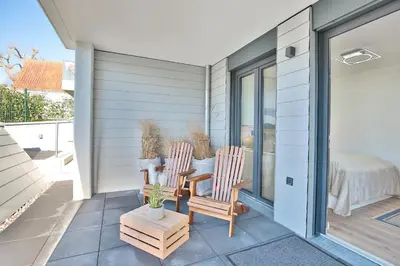 Ein Balkon oder eine Terrasse in der Unterkunft View 91 Ferienwohnung Dünenblick App 1