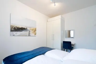 Ein Bett oder Betten in einem Zimmer der Unterkunft Haus Seeburg Wohnung 5