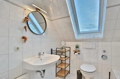 Ein Badezimmer in der Unterkunft Maison Baltique Niendorf Ferienwohnung 