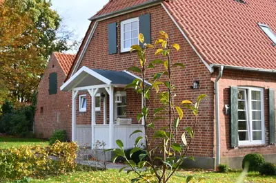 Ein Garten an der Unterkunft Hyggelig in Holstein