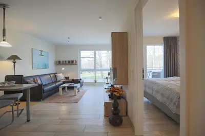 Ein Sitzbereich in der Unterkunft Strandglück Haus A Strandglück, App 04a
