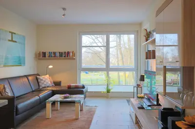 Ein Sitzbereich in der Unterkunft Strandglück Haus A Strandglück, App 04a