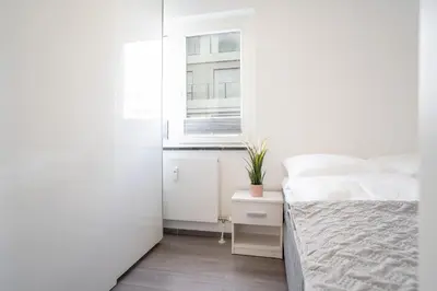 Ein Bett oder Betten in einem Zimmer der Unterkunft Residenz am Hang Saltwater Suite
