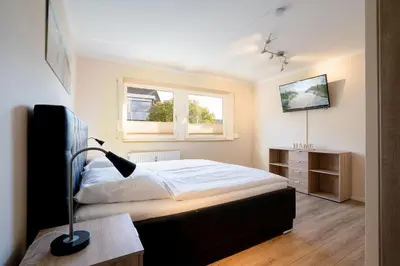 Ein Bett oder Betten in einem Zimmer der Unterkunft MEI27 Strandperle