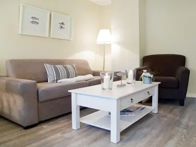 Ein Sitzbereich in der Unterkunft TRA7c Ferienwohnung Kossmann