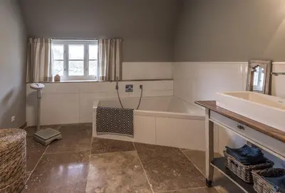 Ein Badezimmer in der Unterkunft Reethaus Hoheleuchte
