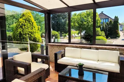 Ein Sitzbereich in der Unterkunft Moderne Ferienwohnung mit Sonnenterrasse & Gartenblick - Strandnah und Parkplatz in ruhiger Lage - hoher Schlafkomfort