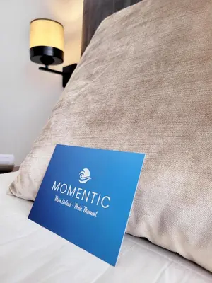 Ein Bett oder Betten in einem Zimmer der Unterkunft Strandnahe Ferienwohnung - sehr modern und hochwertig eingerichtet, inklusive Parkplatz, Gartenzugang und Fahrradunterstellmöglichkeit