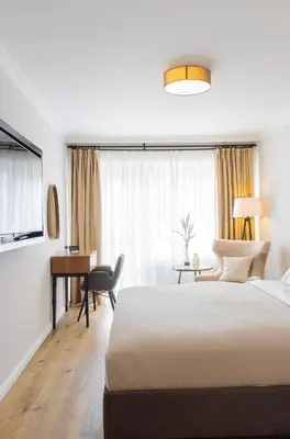 Ein Bett oder Betten in einem Zimmer der Unterkunft Moderne 1 Zimmer Ferienwohnung im Landhaus Haffkrug mit Terrasse, Gartenblick und Parkplatz in ruhiger Lage