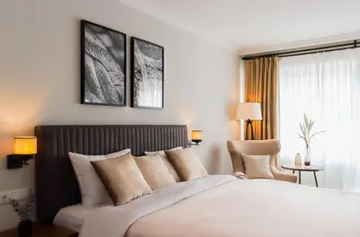 Ein Bett oder Betten in einem Zimmer der Unterkunft Moderne 1 Zimmer Ferienwohnung mit Sonnenterrasse und Parkplatz, in ruhiger Lage, nur wenige Gehminuten zum Ostsee Sandstrand