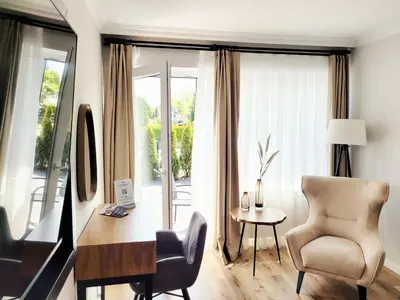 TV/Unterhaltungsangebot in der Unterkunft Nur 7 Gehminuten zum Strand, sehr hochwertige Ferienwohnung mit Terrasse in ruhiger Lage, inklusive Parkplatz und Fahrradunterstellplatz lässt keine Wünsche offen