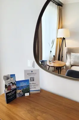 Ein Bett oder Betten in einem Zimmer der Unterkunft Hochwertige Ferienwohnung in ruhiger Lage mit eigener Terrasse und Parkplatz, nur 7 Gehminuten zum Strand entfernt - hoher Schlafkomfort dank Boxspringbett