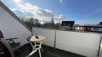 Ein Balkon oder eine Terrasse in der Unterkunft Travemünde Leuchtfeuer