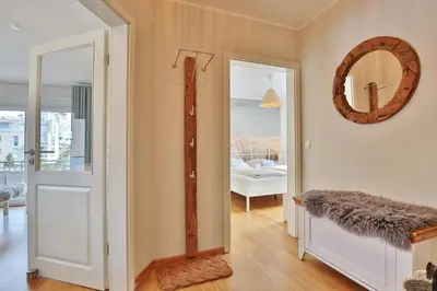 Ein Bett oder Betten in einem Zimmer der Unterkunft Haus Sommerwind Sommerwind, Appartement 4