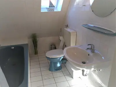 Ein Badezimmer in der Unterkunft Bahnhofsweg 12