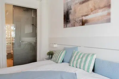 Ein Bett oder Betten in einem Zimmer der Unterkunft Ferienwohnung Ocean Lodge Travemünde