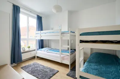 Ein Bett oder Betten in einem Zimmer der Unterkunft Ferienwohnung Hafenbucht Moba-Travel