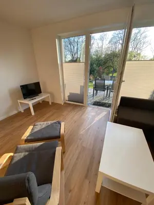 Ein Sitzbereich in der Unterkunft Ferienhaus Wesloer Landstraße 6a für 4 Personen