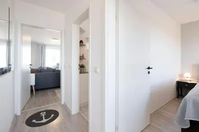 Ein Bett oder Betten in einem Zimmer der Unterkunft Strandresidenz Lütte Deern 10