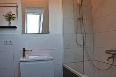 Ein Badezimmer in der Unterkunft Heuboden