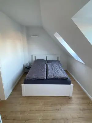 Ein Bett oder Betten in einem Zimmer der Unterkunft Haus Wesloer Landstraße 6b für 4 Personen