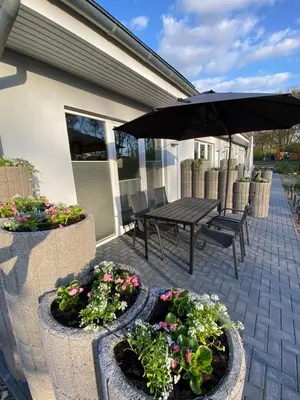 Ein Garten an der Unterkunft Haus Wesloer Landstraße 6b für 4 Personen