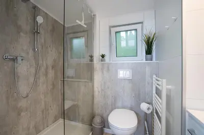 Ein Badezimmer in der Unterkunft Ostseecamp Lübecker Bucht Ferienhaus 
