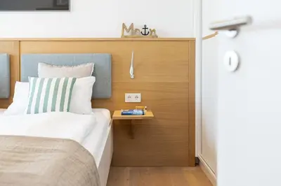 Ein Bett oder Betten in einem Zimmer der Unterkunft View 91 Sonnenschein Scharbeutz