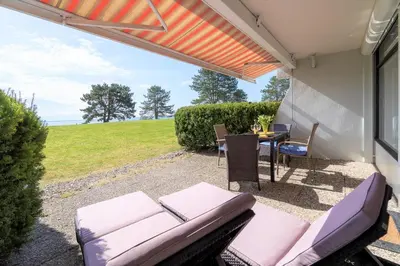 Ein Sitzbereich in der Unterkunft Ferienpark Sierksdorf App 27 - Strandlage