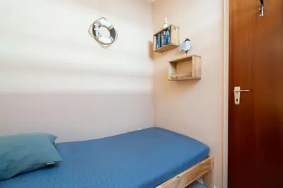 Ein Bett oder Betten in einem Zimmer der Unterkunft Ferienpark Sierksdorf App 61 - Strandlage