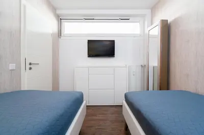 Ein Bett oder Betten in einem Zimmer der Unterkunft Ferienpark Sierksdorf App 111 - Strandlage
