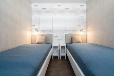 Ein Bett oder Betten in einem Zimmer der Unterkunft Ferienpark Sierksdorf App 111 - Strandlage