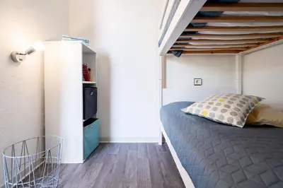Ein Bett oder Betten in einem Zimmer der Unterkunft Ferienpark Sierksdorf App 176 - Strandlage