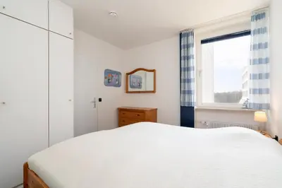 Ein Bett oder Betten in einem Zimmer der Unterkunft Ferienpark Sierksdorf App 299 - Strandlage