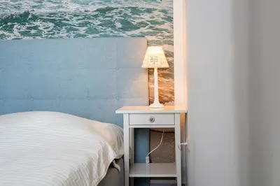 Ein Bett oder Betten in einem Zimmer der Unterkunft Ferienpark Sierksdorf App 334 - Strandlage