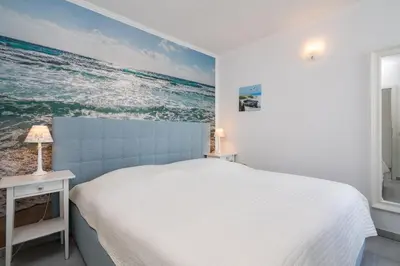 Ein Bett oder Betten in einem Zimmer der Unterkunft Ferienpark Sierksdorf App 334 - Strandlage