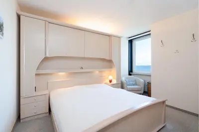 Ein Bett oder Betten in einem Zimmer der Unterkunft Ferienpark Sierksdorf App 295 - Strandlage