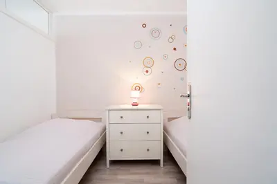 Ein Bett oder Betten in einem Zimmer der Unterkunft Ferienpark Sierksdorf App 364 - Strandlage