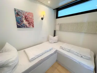 Ein Bett oder Betten in einem Zimmer der Unterkunft Ferienpark Sierksdorf App 369 - Strandlage