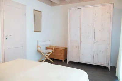 Ein Bett oder Betten in einem Zimmer der Unterkunft Strandpark Sierksdorf H080