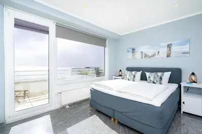 Ein Bett oder Betten in einem Zimmer der Unterkunft Ferienpark Sierksdorf App 827 - Penthouse