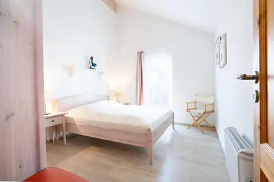 Ein Bett oder Betten in einem Zimmer der Unterkunft Strandpark Sierksdorf H060