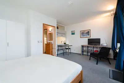 Ein Bett oder Betten in einem Zimmer der Unterkunft Ferienpark Sierksdorf App 715 - Strandlage