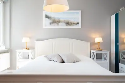 Ein Bett oder Betten in einem Zimmer der Unterkunft Ferienpark Sierksdorf App 864 - Strandlage