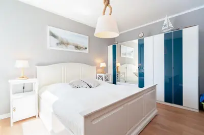 Ein Bett oder Betten in einem Zimmer der Unterkunft Ferienpark Sierksdorf App 864 - Strandlage