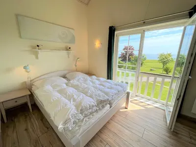 Ein Bett oder Betten in einem Zimmer der Unterkunft Strandpark Sierksdorf H092 