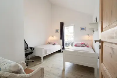 Ein Bett oder Betten in einem Zimmer der Unterkunft Strandpark Sierksdorf H052