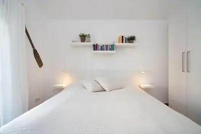 Ein Bett oder Betten in einem Zimmer der Unterkunft Strandpark Sierksdorf H057