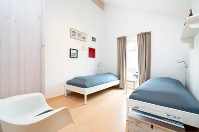 Ein Bett oder Betten in einem Zimmer der Unterkunft Strandpark Sierksdorf H058